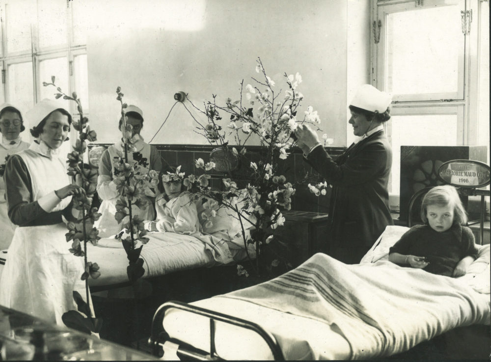 Decorating a children's ward, 1920s